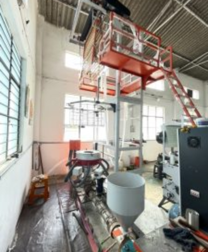 Large-scale industrial machinery inside factory premises